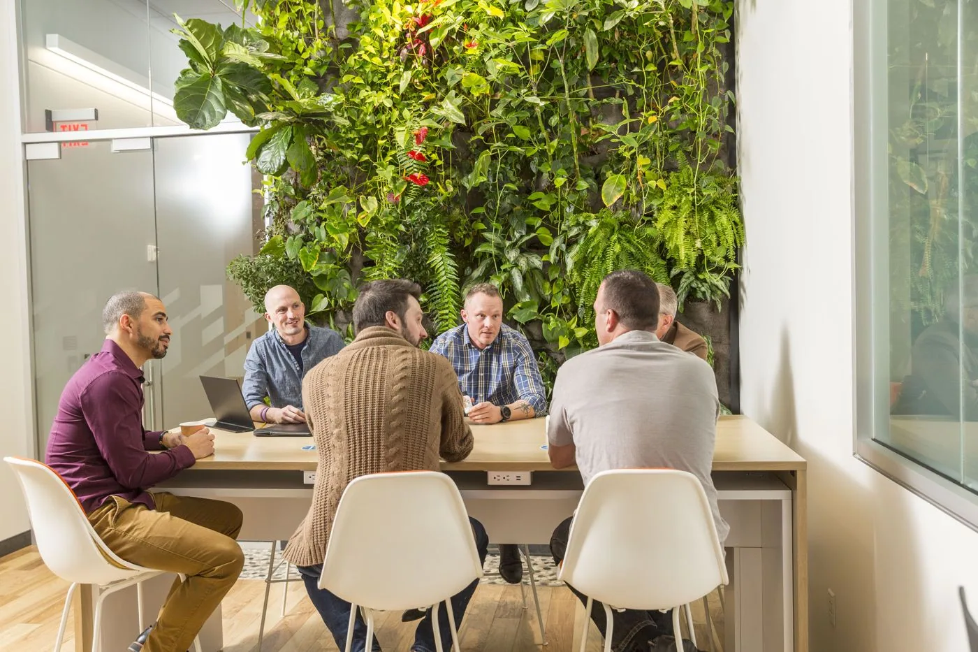 UFO team meeting at the green wall