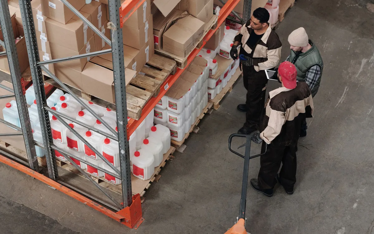 Illustrative stock: A distribution team collaborating in a warehouse