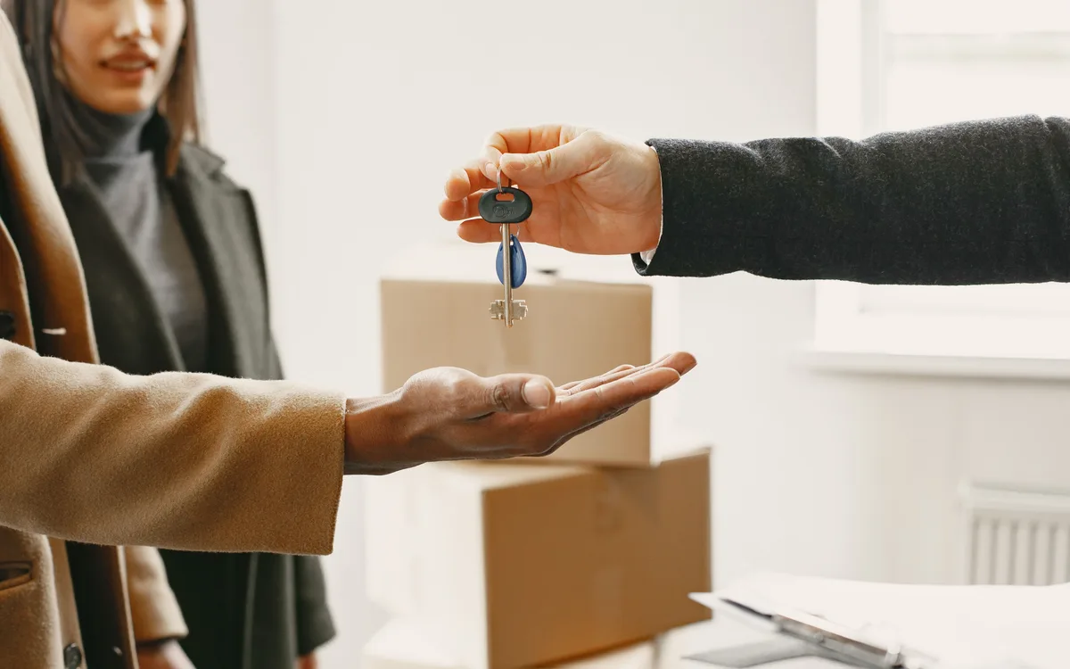 Illustrative stock: New homeowners receiving the keys to their home