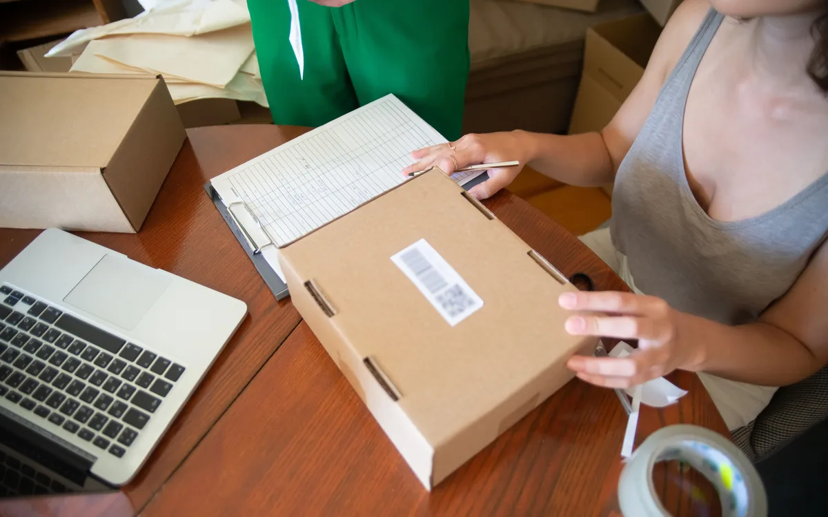 Illustrative stock: An ecommerce team packing customer orders