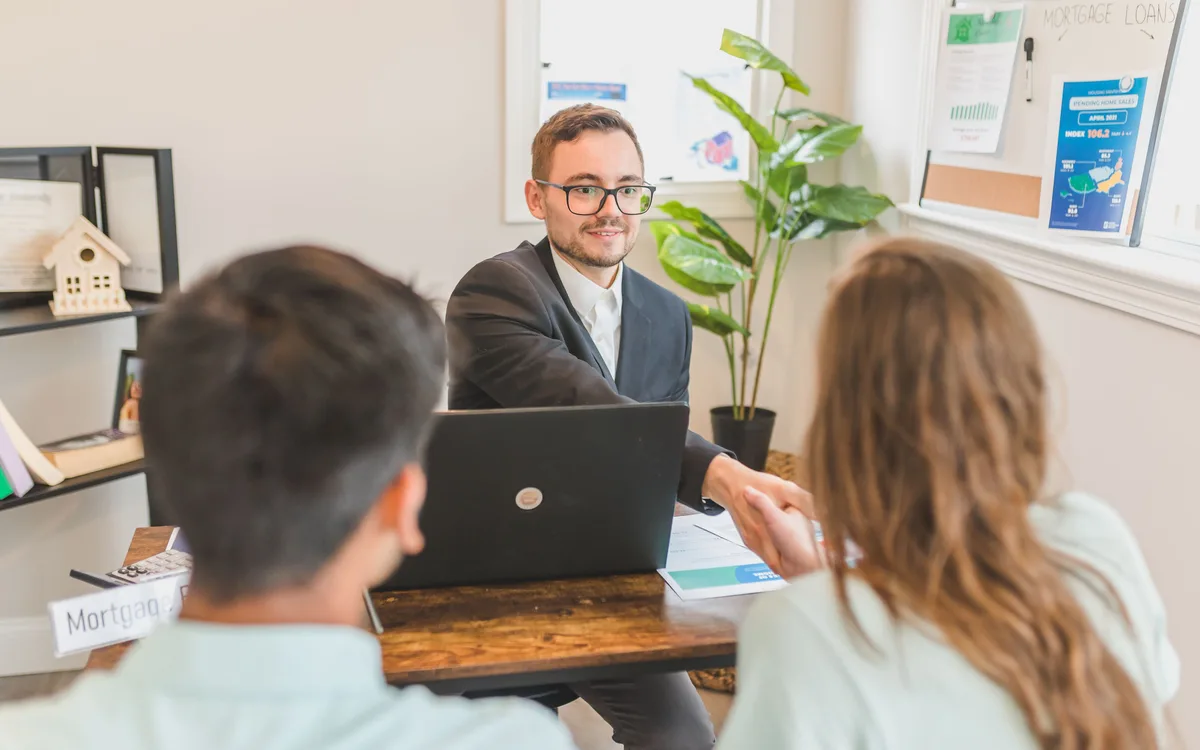 Illustrative stock: A mortgage adviser meeting with a client